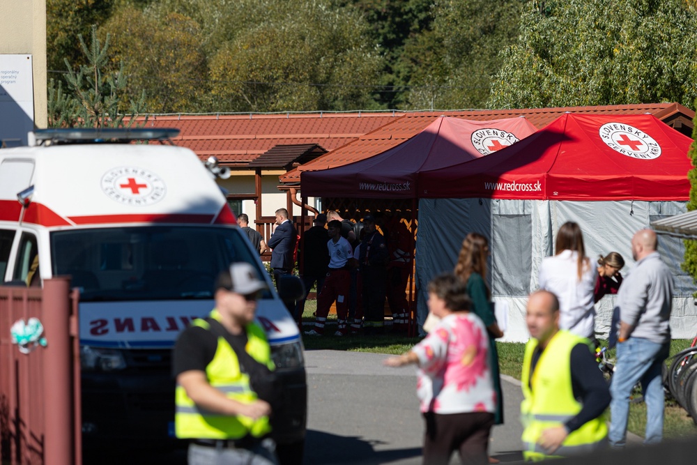 Slovak Red Cross members work at a site following a stabbing attack by a pupil at the primary school in Staskov, Slovakia, Tuesday, Sept. 29, 2026. (Daniel Stehlik/TASR via AP) (Tlacova agentura SR)