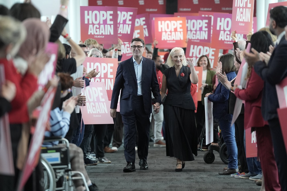 Prime Minister Andy Burnham and his wife Marie-France Van Heel arrive ahead of his keynote speech to the Labour Party conference (Stefan Rousseau/PA) (PA Wire)