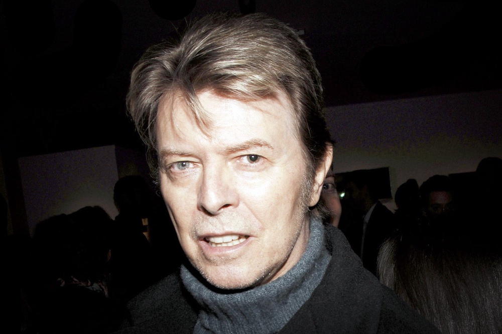 David Bowie attends the opening of Lou Reed NY photography exhibit at the Gallery at Hermes on January 19, 2006 (Getty)