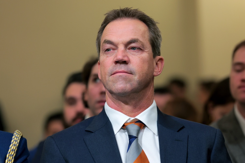 The divorce filing came months after photos were released of Bryon wearing pink shorts and a skin-colored top with two balloons tucked into it to look like huge breasts (Getty Images)