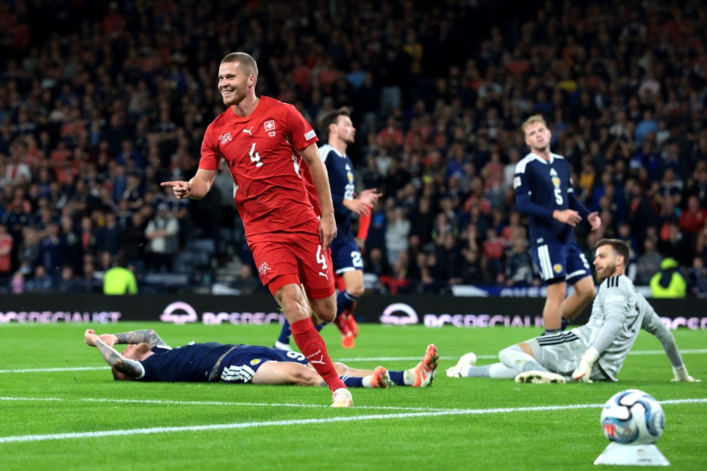 Nico Elvedi scored the second goal as the Swiss swept Scotland aside (Getty)