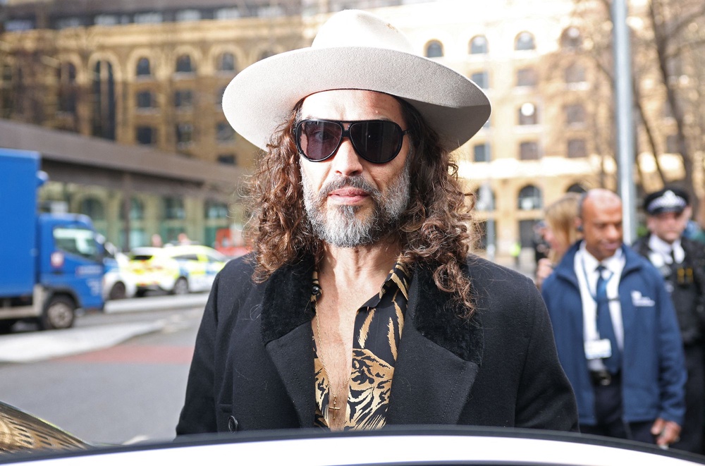 Brand, who has pleaded not guilty to every charge against him, is reportedly set to face trial starting on October 12 (AFP via Getty Images)