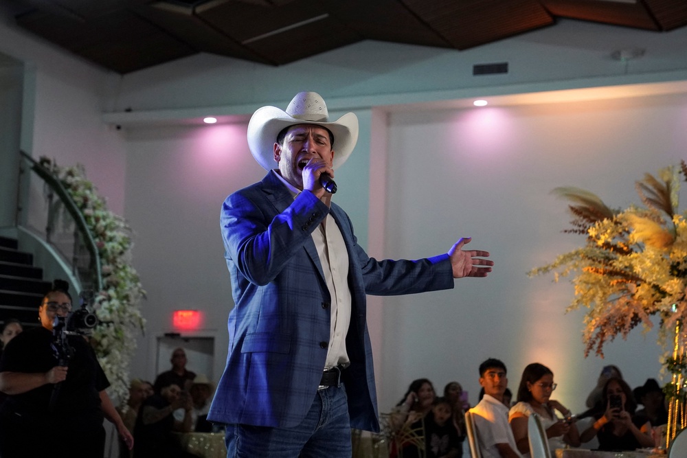 Bobby Pulido, a Latin Grammy winner and Democratic candidate for Texas 15th Congressional District, performs in August (Reuters)