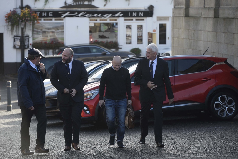 Alastair Power, the deputy district master of Portadown Orange Order, Loyalist spokesperson and Orange order representative Jamie Bryson and the Orange Order’s Portadown District Master Nigel Dawson arrive at Hillsborough Castle (Mark Marlow/PA) (PA Wire)