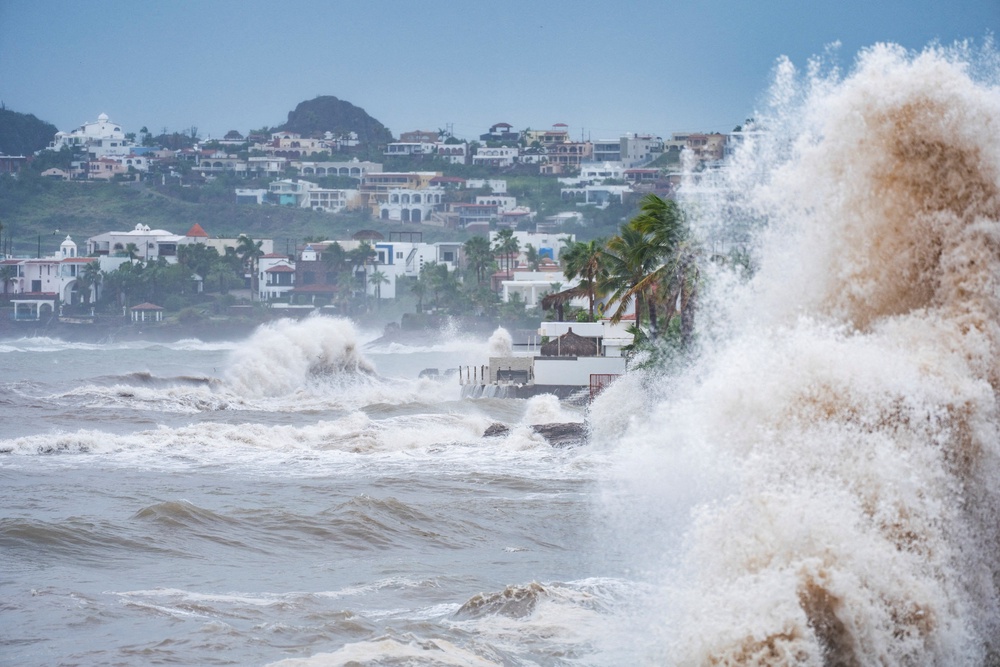 Waves crash on Manglares Beach in the aftermath of Hurricane Polo in San Carlos, Sonora state, Mexico. (Reuters)