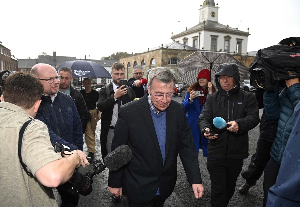 Breandan Mac Cionnaith and members of the Garvaghy Road Residents coalition at Hillsborough Castle (Mark Marlow/PA) (PA Wire)