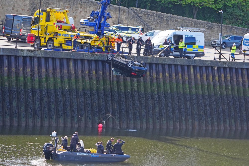 A car is removed from the River Wear in Sunderland (Owen Humphreys/PA) (PA Wire)