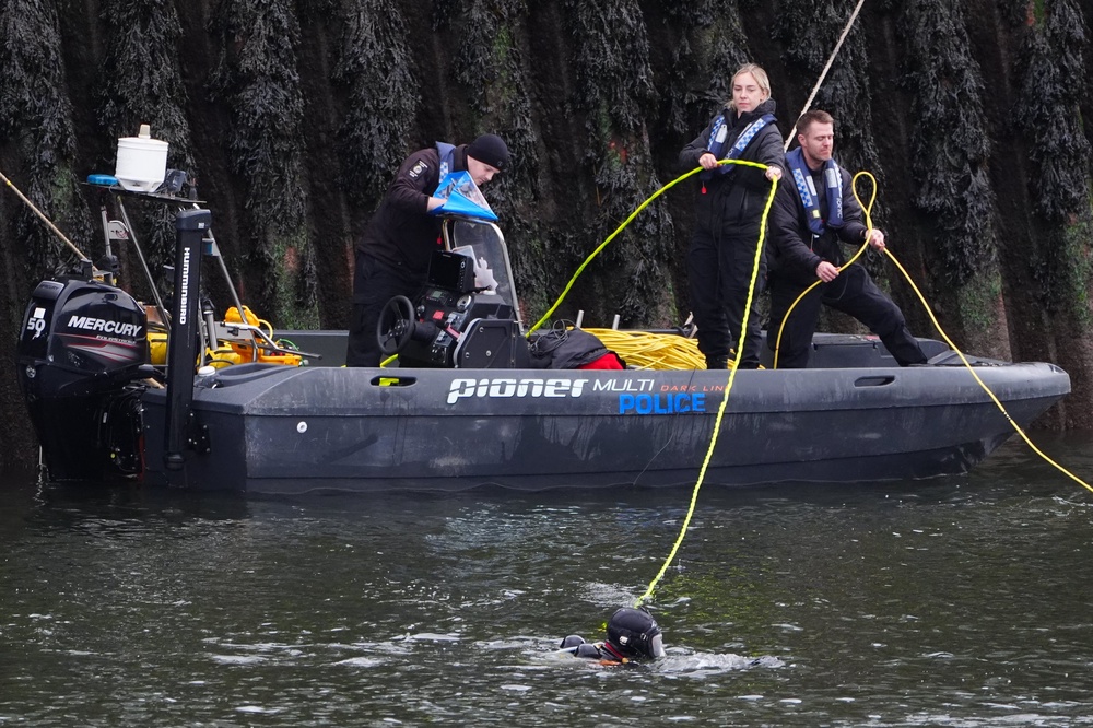 Police divers at the scene on the River Wear in Sunderland (Owen Humphreys/PA) (PA Wire)