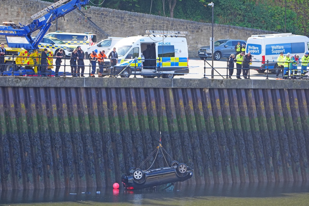 The car being removed from the River Wear in Sunderland (Owen Humphreys/PA) (PA Wire)