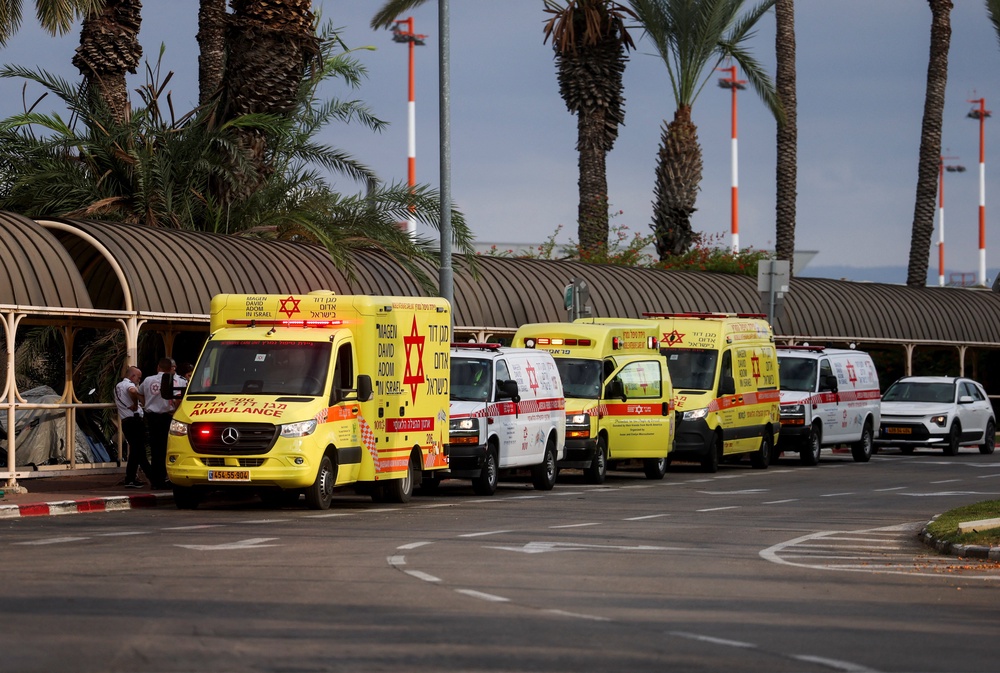 Ambulances wait at the Ben Gurion International Airport (Reuters)