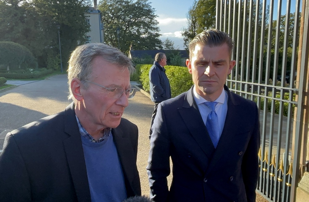 Breandan Mac Cionnaith (left) of the Garvaghy Road Residents Coalition speaks to the media on Wednesday evening after leaving Hillsborough Castle (Rebecca Black/PA) (PA Wire)