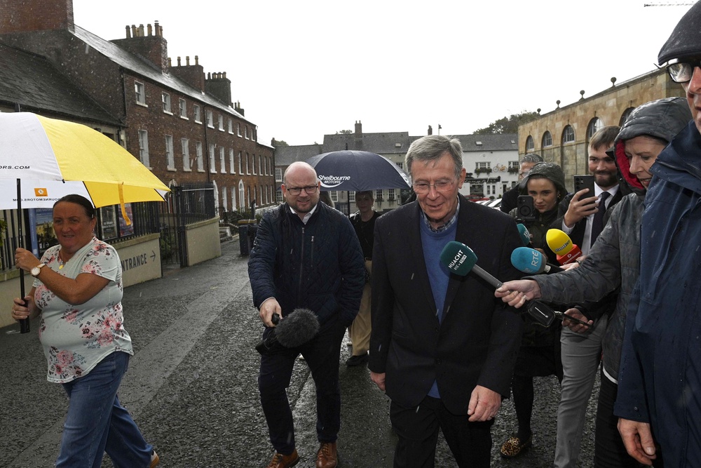 Breandan Mac Cionnaith and members of the Garvaghy Road Residents coalition at Hillsborough Castle (Mark Marlow/PA) (PA Wire)