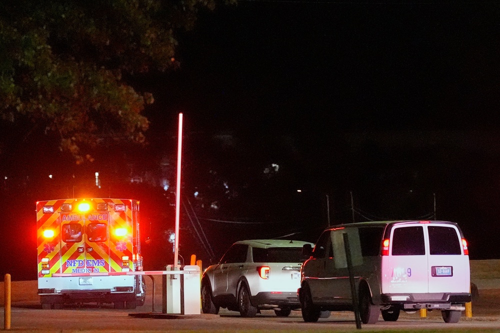 Emergency vehicles leave Riverbend Maximum Security Institution after the execution of Christa Pike was halted (AP)