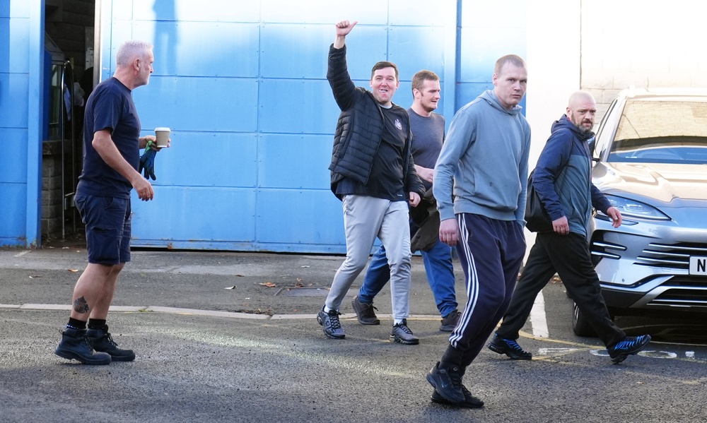 People leaving HMP Durham in north east England (PA)