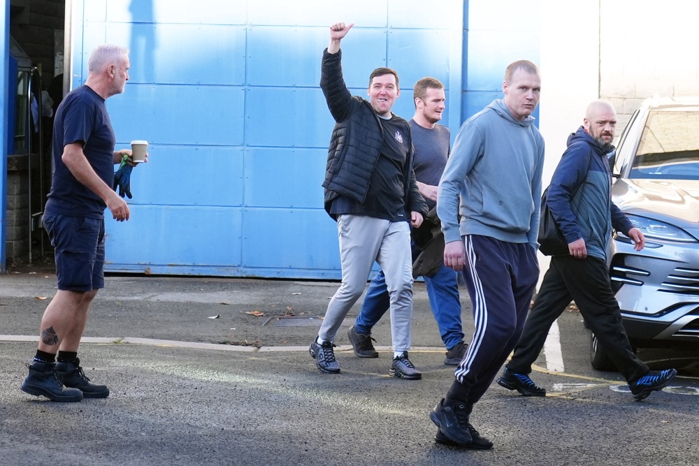 People leaving HMP Durham in north east England (PA)