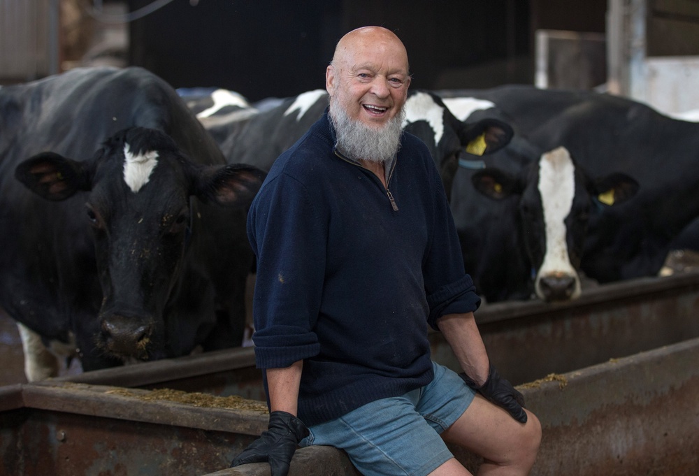 Glastonbury co-founder Michael Eavis with his dairy cows (Getty)