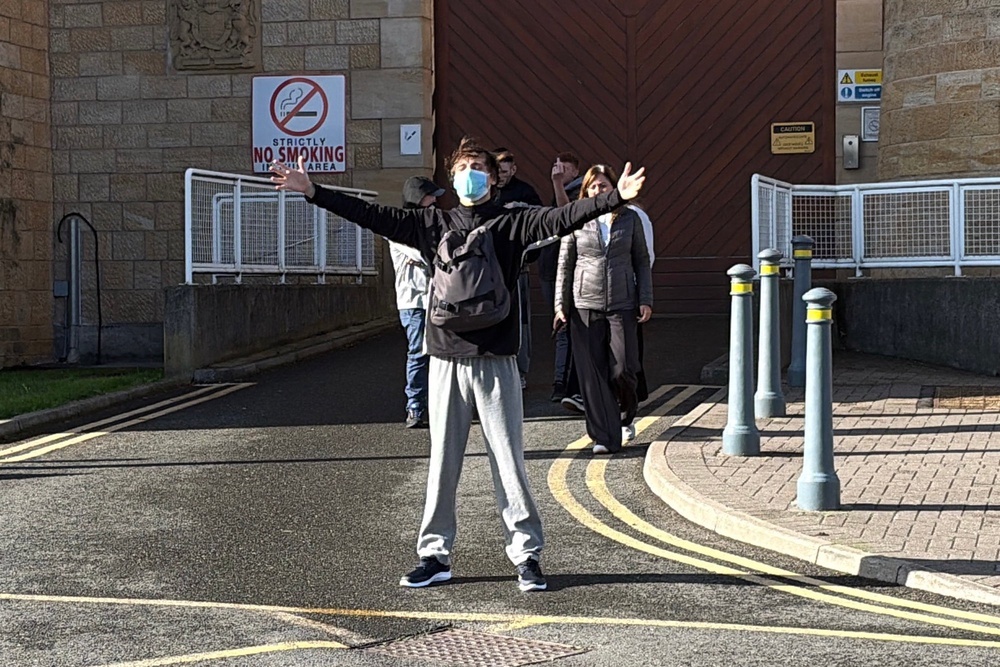 A person leaving HMP Leeds in West Yorkshire (PA)