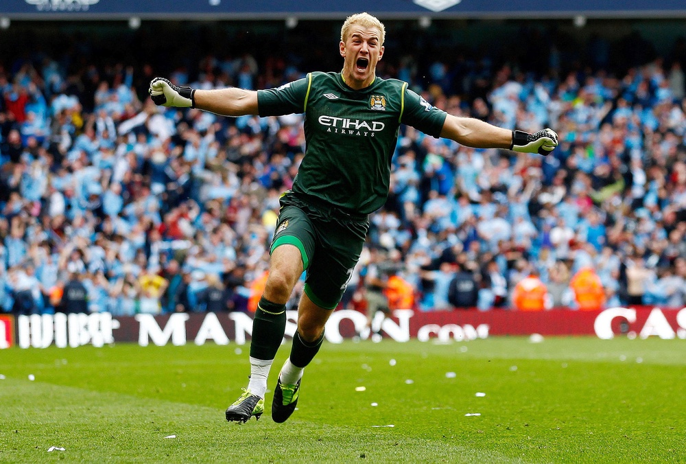 Joe Hart celebrates Sergio Aguero's famous winner against QPR at the Etihad Stadium (Reuters)