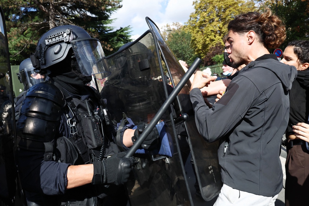 French students clash with police near Lycée Le Corbusier Senior high school in Aubervilliers, Paris (Getty)