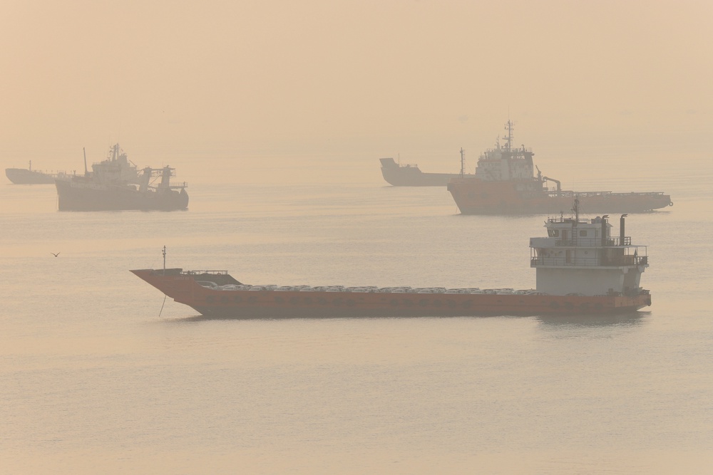 Vessels in the Strait of Hormuz near the beach of Bandar Abbas, Iran (Reuters)