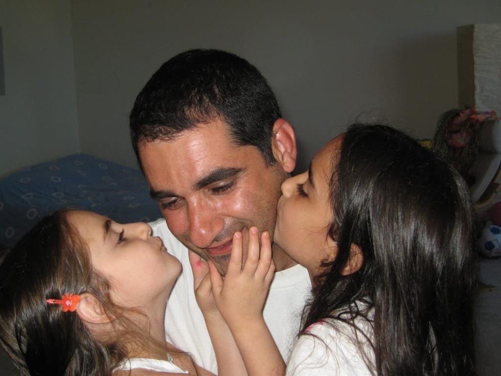 Sigal said it was her mission to continue the legacy of her daughters (pictured with their father when they were children) and to do good in the world (Courtesy of Sigal Manzuri)