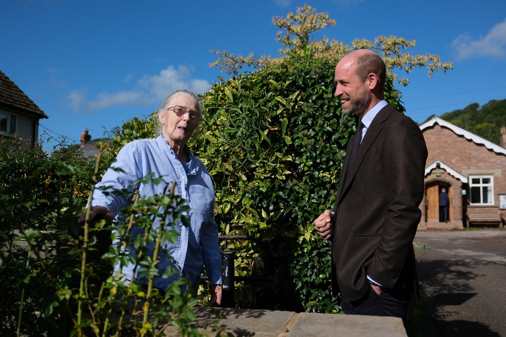 The Prince of Wales meets local resident Jacqueline Brown, during a visit to the village of Skenfrith (Mathieu Willcocks/PA) (PA Wire)