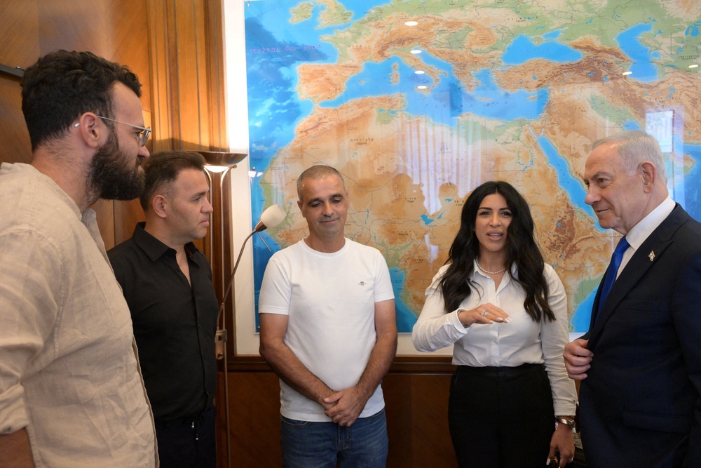 Israeli Prime Minister Benjamin Netanyahu meets with Yaniv Hayoun, Or Fradilov, Dr. Shota Musayev and his wife, Sigalit, who he described as 