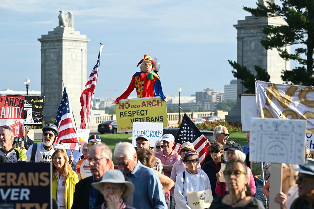 Trump has defended his Washington, DC-wide makeover, which now includes plans to turn his 250-foot ‘triumphal’ arch into a military installation, drawing protests at the site (AFP/Getty)
