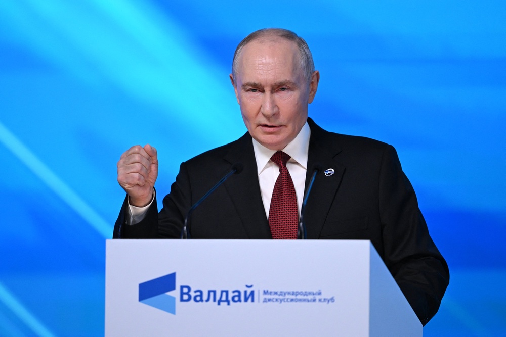Russia's President Vladimir Putin gestures as he addresses the audience during the Valdai Discussion Club meeting in Moscow on October 1 (AFP/Getty)