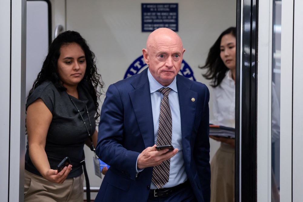 Sen. Mark Kelly (D-Ariz.) said Trump was not being serious about AI oversight (Reuters)