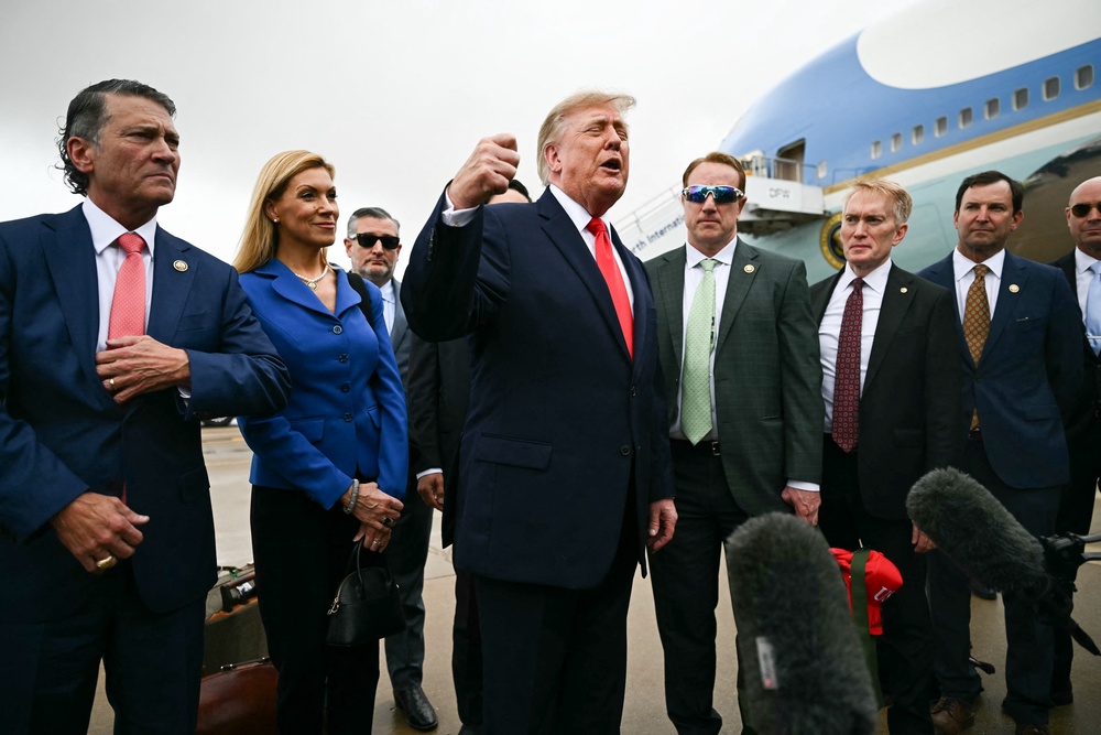 Donald Trump, flanked by allies including Texas Sen. Ted Cruz and Oklahoma Sen. James Lankford, jetted to the Southwest on Thursday to save GOP candidates (AFP/Getty)