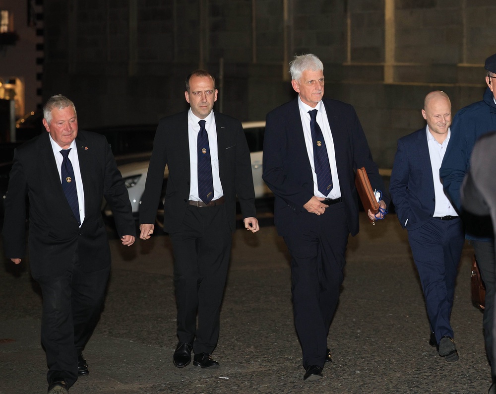 Nigel Dawson, the district master of the Orange Order in Portadown, (third left) and legal adviser to the Orange Order and spokesperson Jamie Bryson (right) arrive at Hillsborough Castle (Liam McBurney/PA) (PA Wire)