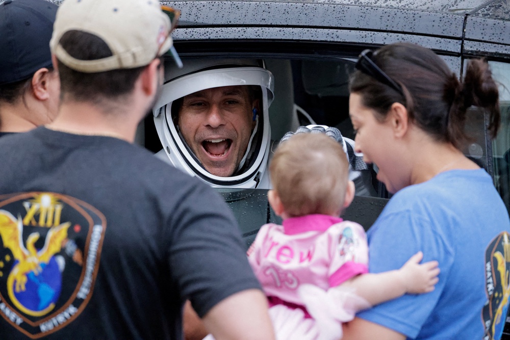 NASA astronaut Luke Delaney reacts to family members, as he departs for the launch pad at the Kennedy Space Center in Cape Canaveral, Florida, US, October 1, 2026 (Reuters)