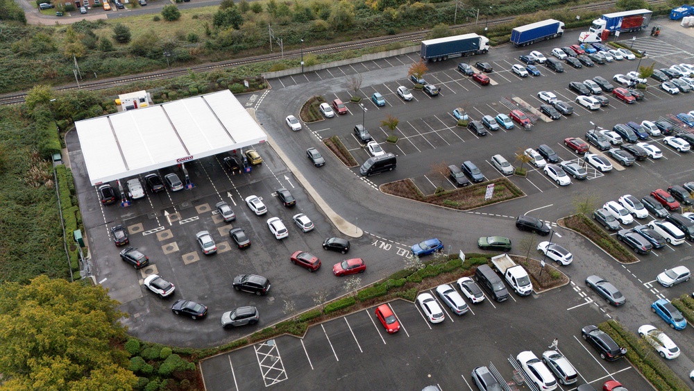 Motorists queue for fuel at Costco in Coventry as the price of a litre of diesel hit a record high (PA)