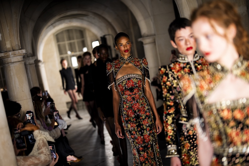 Red lips and soft blush dominated Annie’s runway in London (Jordan Pettitt/PA)