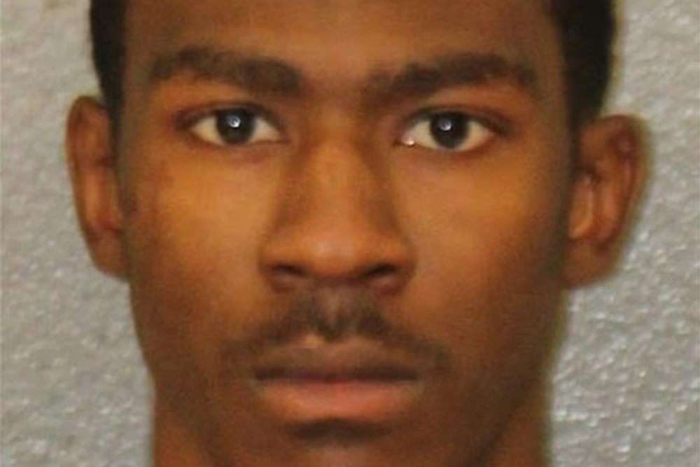 Terrance Jackson, 22, was charged with accessory after the fact for allegedly helping to dispose of one of the stolen vehicles used in the shooting (Charlotte-Mecklenburg Police Department)