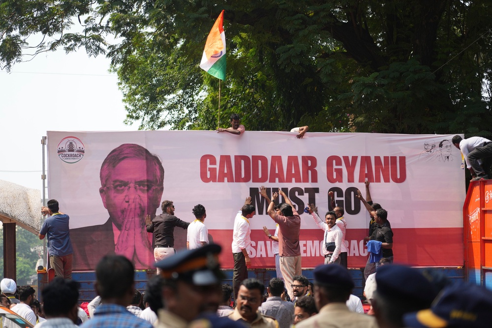 Supporters of the Cockroach Janta Party in Mumbai shout slogans during a protest against CEC Kumar and call for the suspension of the revision of electoral rolls (AP)