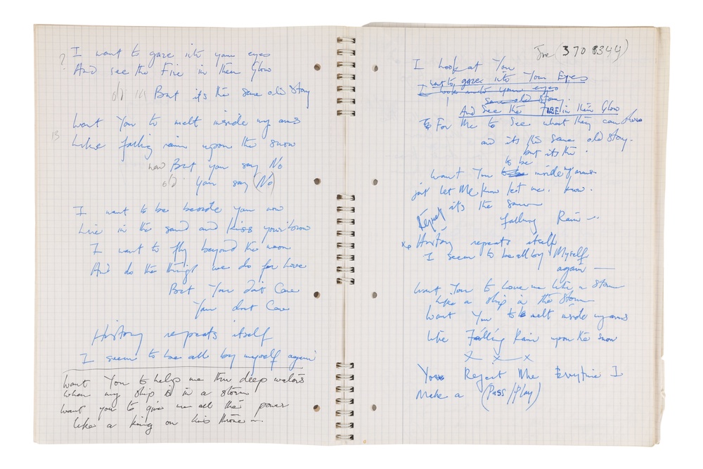 A notebook containing Freddie Mercury's song lyrics which has sold for £277,000 at auction (PA)