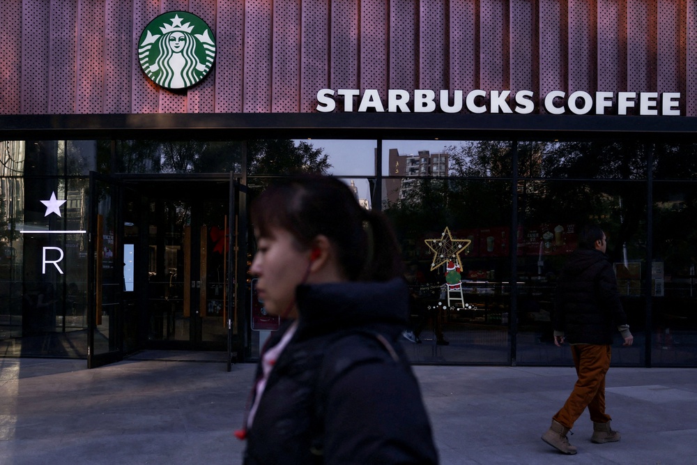 Starbucks customers in China will now have to buy something before taking a seat in its cafés, as the coffee chain tightens its rules on who can use its stores (Reuters)