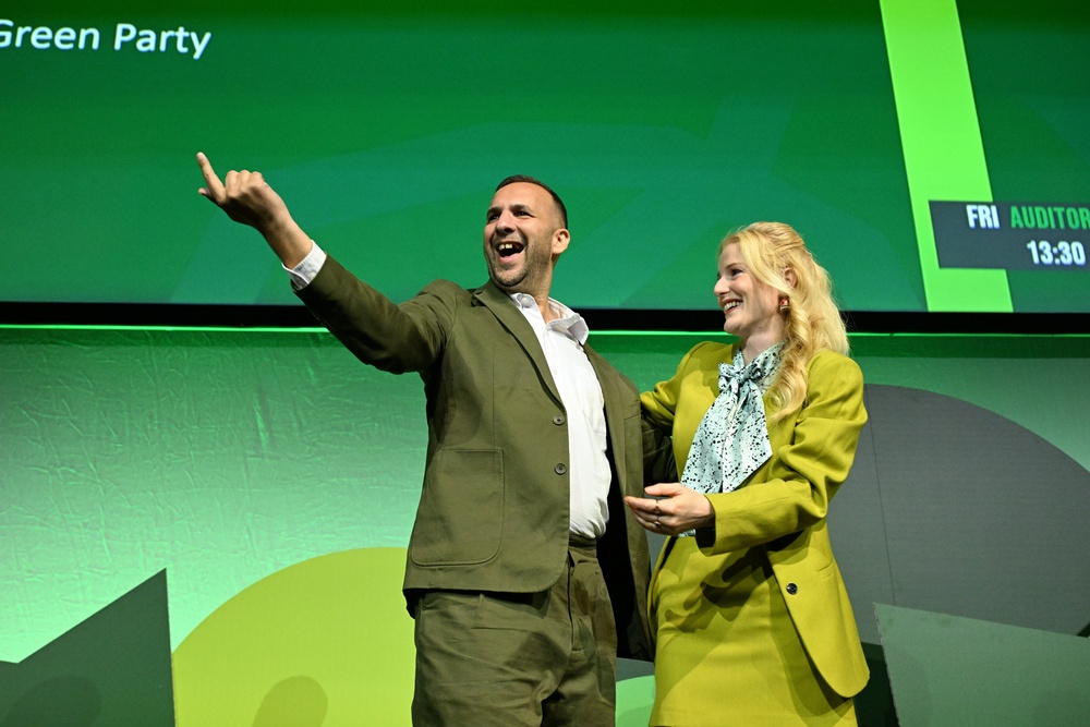 Green Party leader Zack Polanski is joined by MP Hannah Spencer after delivering his speech (Will Colebourne/PA) (PA Wire)