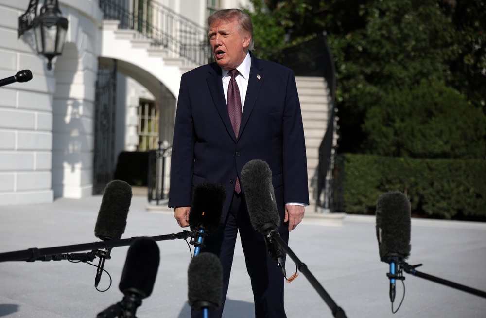 U.S. President Donald Trump speaks to members of the media prior to a South Lawn departure at the White House on October 2, 2026 in Washington, DC. President Trump is traveling to Mobile, Alabama to campaign for the upcoming midterm election. (Photo by Alex Wong/Getty Images) (Getty)
