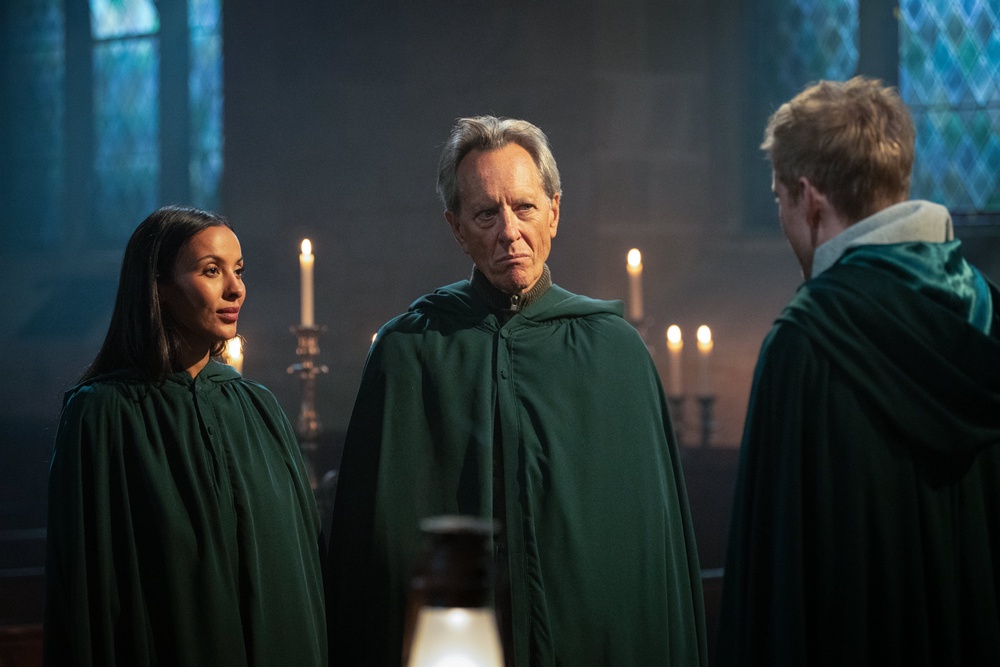 Maya Jama, Richard E Grant and James Acaster, on the second season of The Celebrity Traitors (PA)