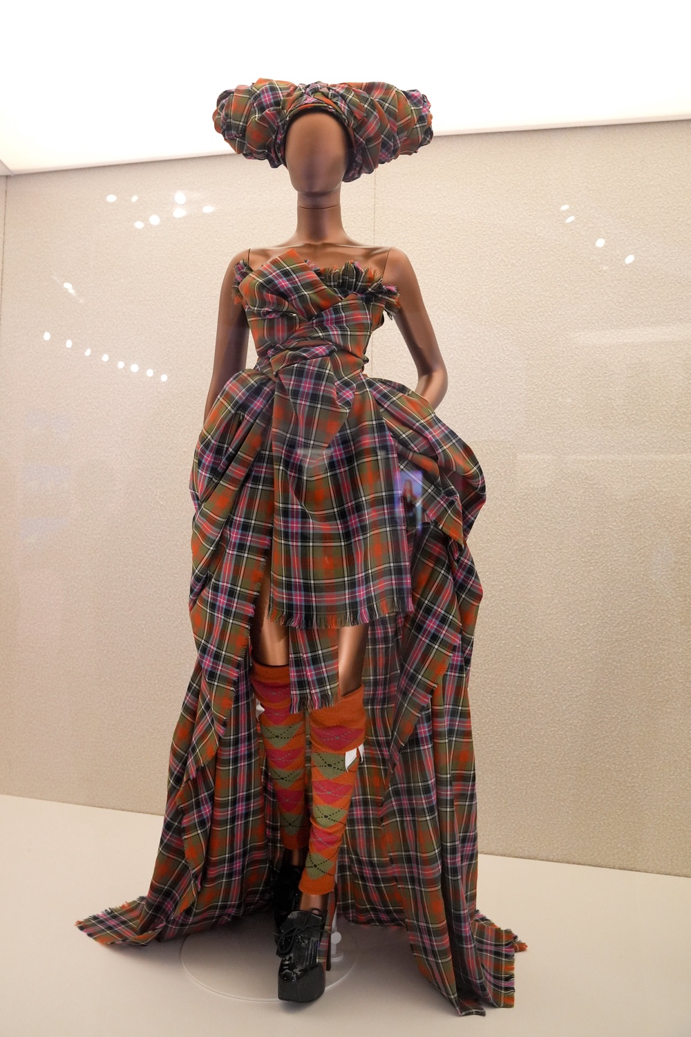 A tartan dress worn by Naomi Campbell during Vivienne Westwood’s AW 1994 Ready-to-Wear fashion show (Lucy North/PA)