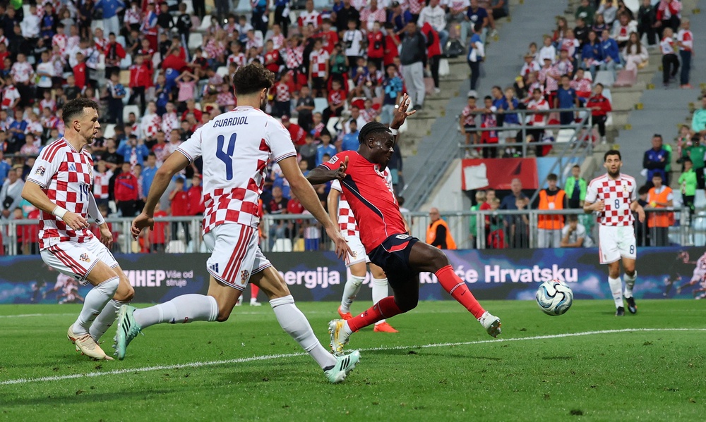Bukayo Saka netted the simplest of tap ins as England notched up four goals in the first half (Reuters)