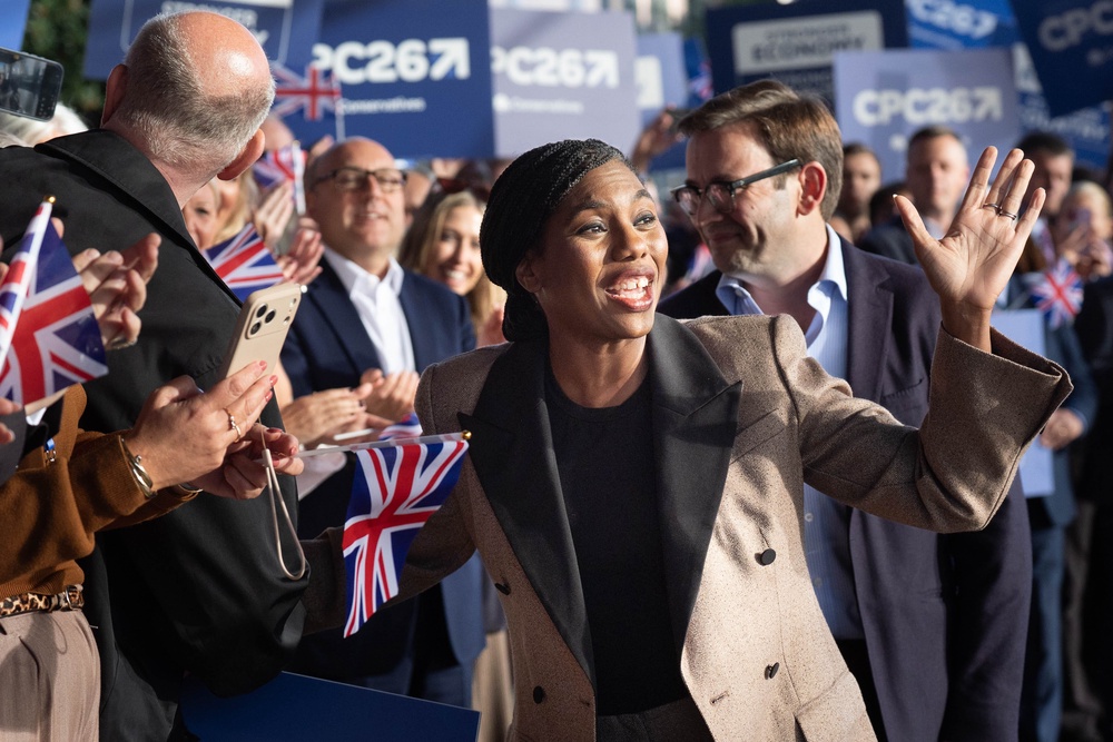Conservative Party leader Kemi Badenoch, with her husband Hamish, arrives at the Conservative Party conference in Birmingham ((Stefan Rousseau/PA))