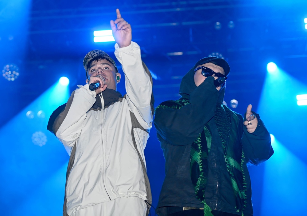 Kneecap performing at the charity community arts festival Feile an Phobail at Falls Park in Belfast (Mark Marlow/PA) (PA Wire)