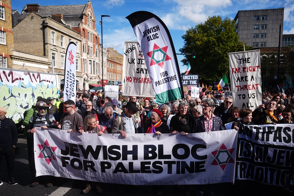 The march marked the 90th anniversary of the Battle of Cable Street (Aaron Chown/PA) (PA Wire)