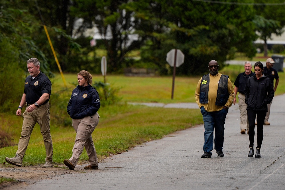 Authorities investigate the scene of a mass shooting where at least two people died and 35 were injured when struck by bullets Sunday morning, according to the Georgia Bureau of Investigation, Sunday, Oct. 4, 2026, in Vienna, Ga. (AP Photo/Mike Stewart) (Copyright 2026 The Associated Press. All rights reserved)