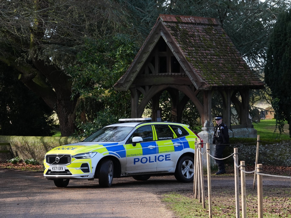 A police car at the entrance to the Sandringham Estate (Gareth Fuller/PA) (PA Archive)