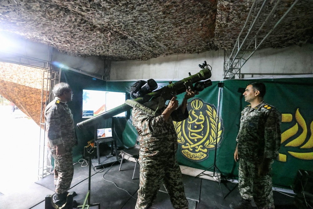 An Iranian officer demonstrates the use of a man-portable air-defense system during the inauguration of the training centre (AFP via Getty Images)